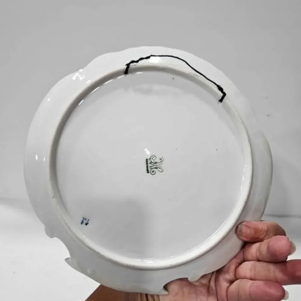 Blue and white windmill decorative plate